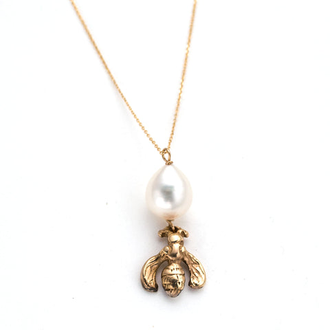 hand carved gold bumblebee charm on delicate gold chain with white pearl accents