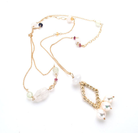 Textured gold, diamond shaped pendant with 3 white pearls, delicate long chain with scattered semi-precious stones