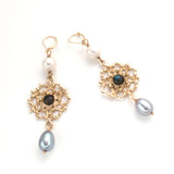 gold open filigree circles with iolite cabochon at center, white pearl at top, dove gray pearl drop below