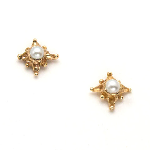 Tiny 14 karat gold post earrings, star design with white pearl center