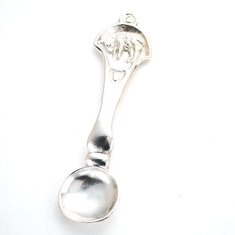 Delightful carved silver Baby spoon, handle depicts lamb on handle.artist anna biggs, delaware