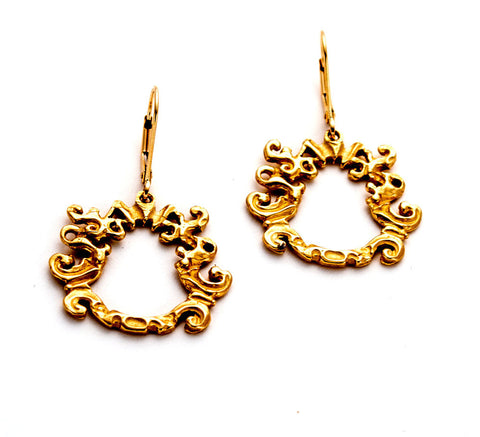 Textural gold, open circle design of sculpted waves, hanging from lever-back ear-wire